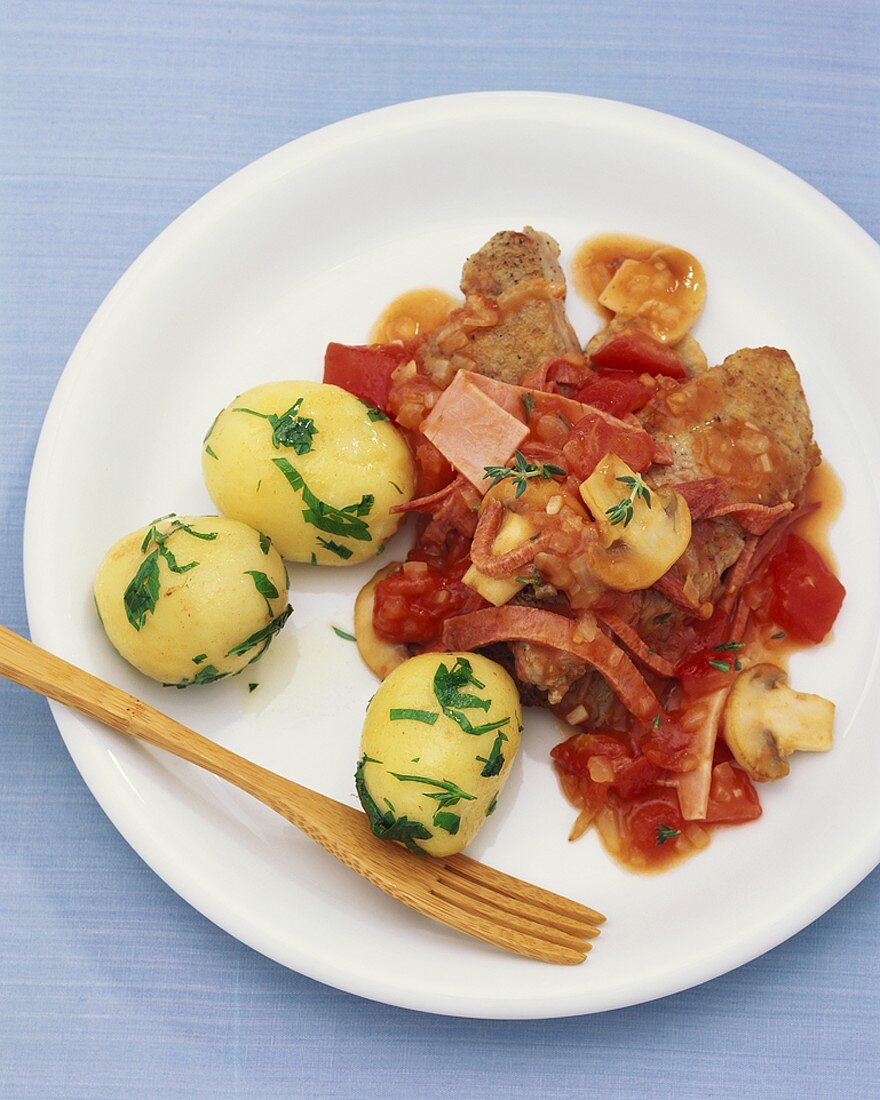 Gypsy schnitzel (Veal escalopes with tomato & mushroom sauce)