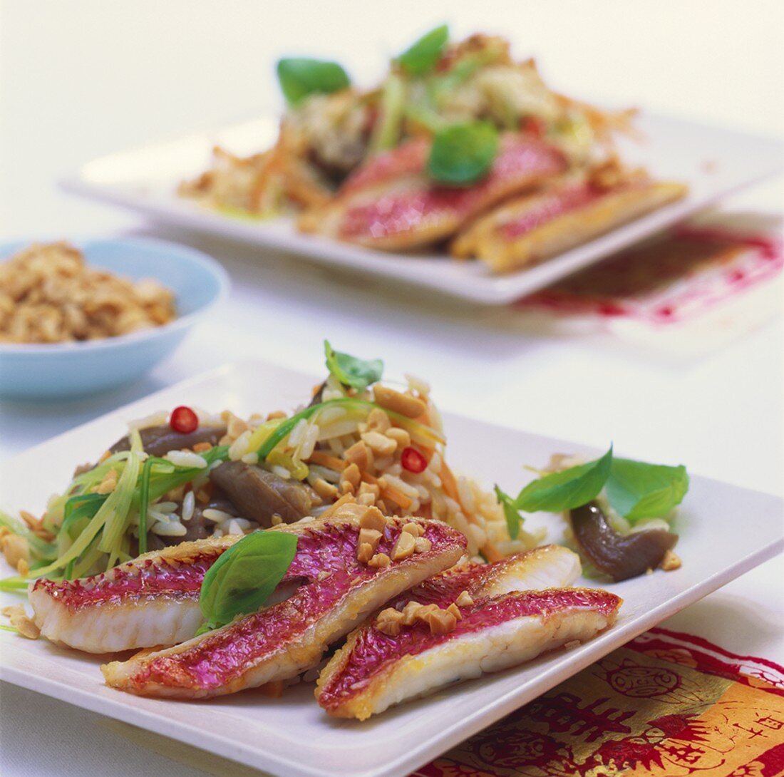 Fried red mullet fillets with peanut and chilli rice