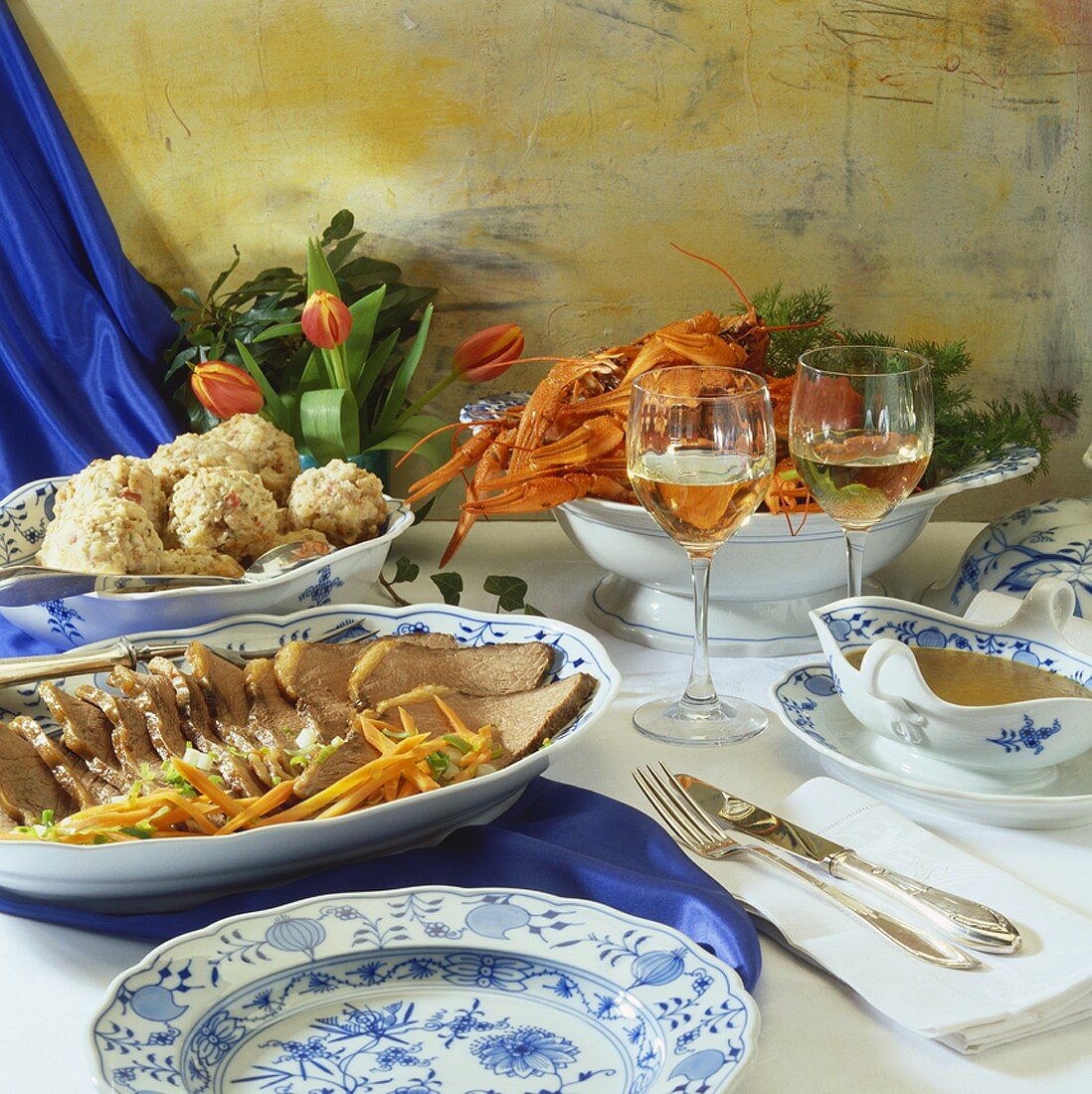 Spread of roast beef, dumplings, gravy, crayfish