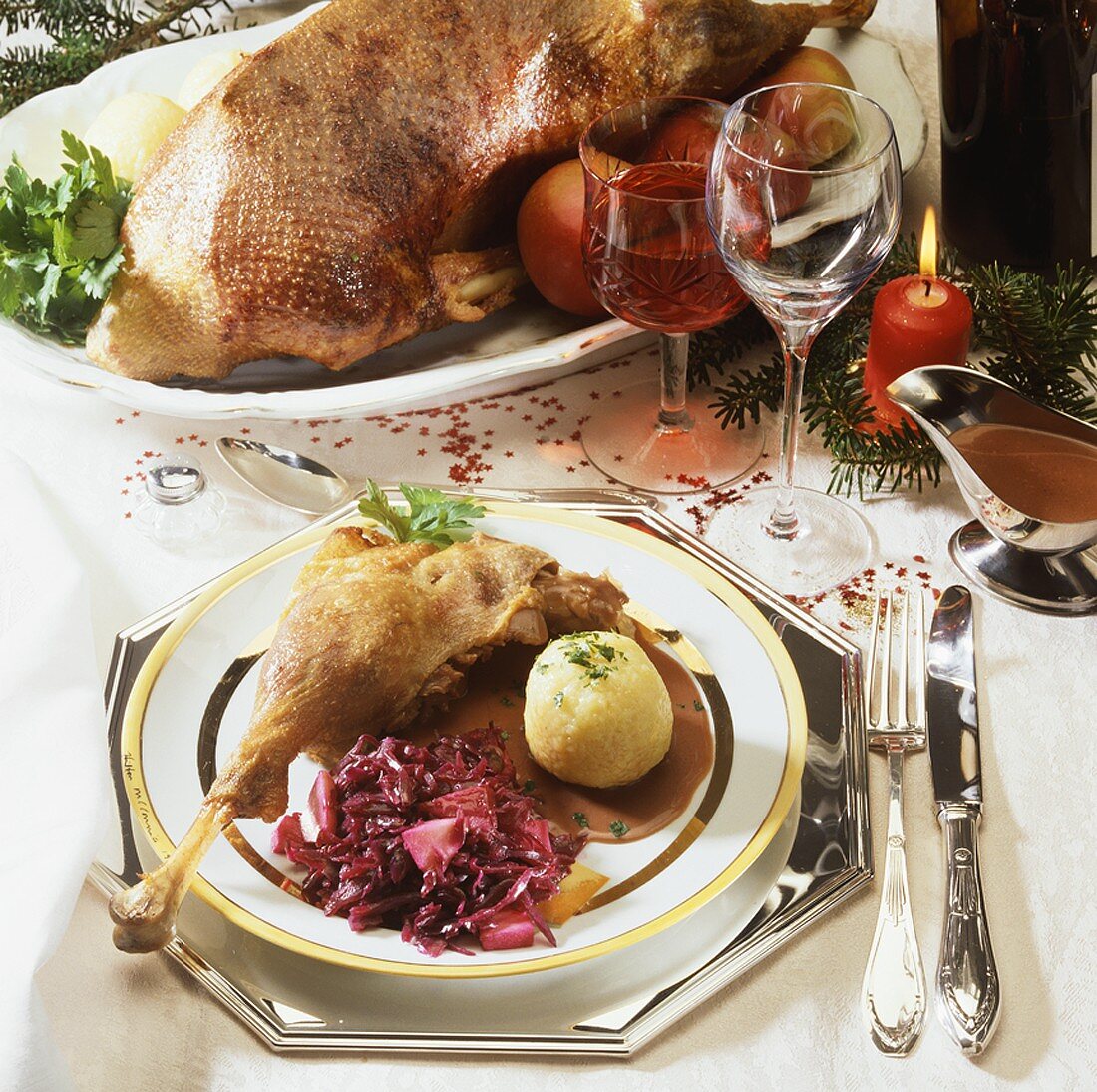Roast goose with apple & red cabbage & dumplings for Christmas
