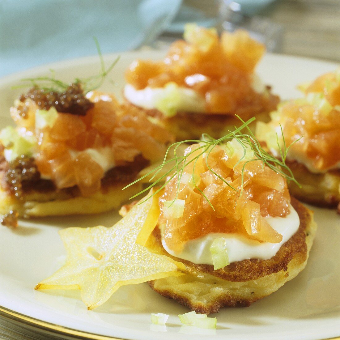 Blinis with ricotta and salmon tartare