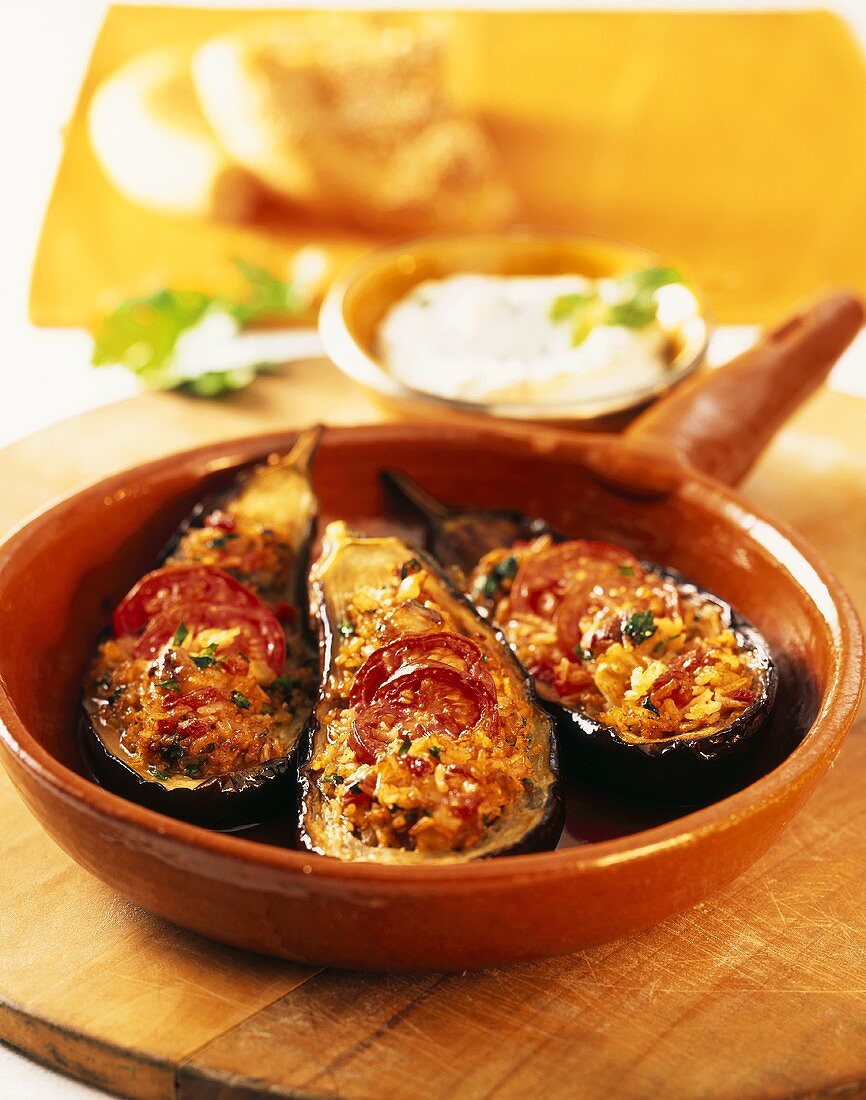 Aubergines with tomato and rice stuffing