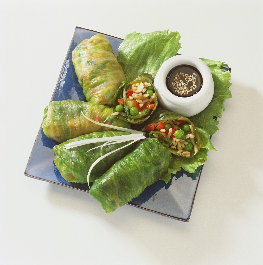 Stuffed lettuce leaves with rice & vegetable filling, soy sauce