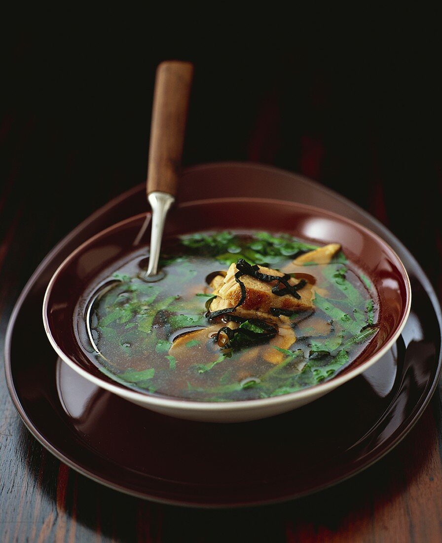 Miso soup with tuna and herbs