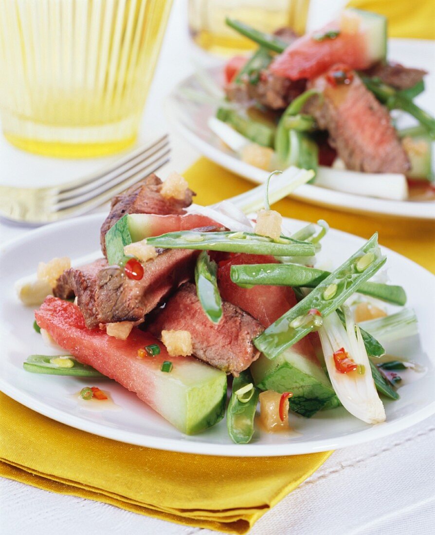 Roast beef with fried watermelon and green beans
