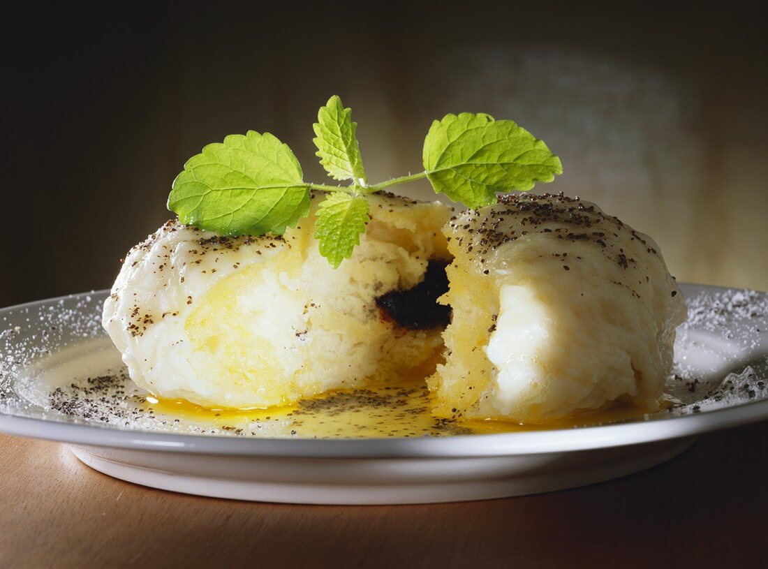 Filled yeast dumpling with poppy seed butter