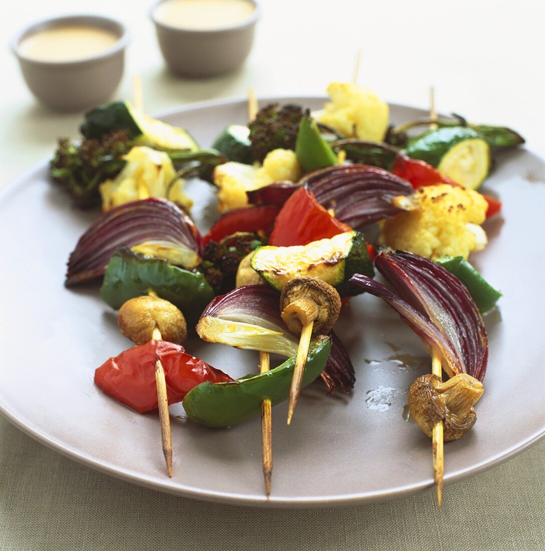 Vegetarian vegetable kebabs with tomato & coconut milk sauce