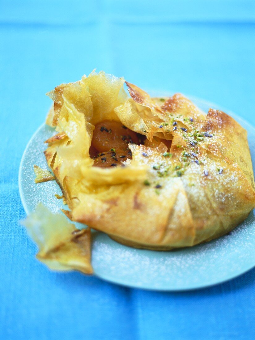 Fried filo pastry purse filled with apricots