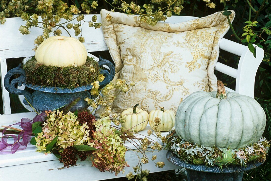 Garden seat with autumn decorations (hydrangeas etc.)