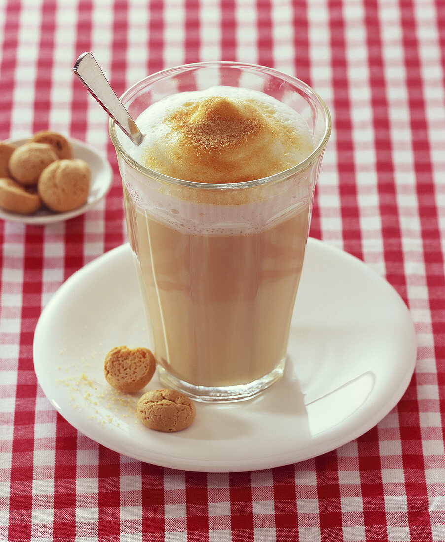 Latte macchiato sprinkled with brown sugar