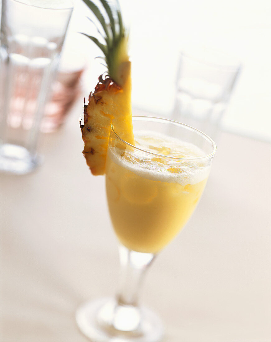 Tutti Frutti: cocktail made with mango syrup & pineapple juice