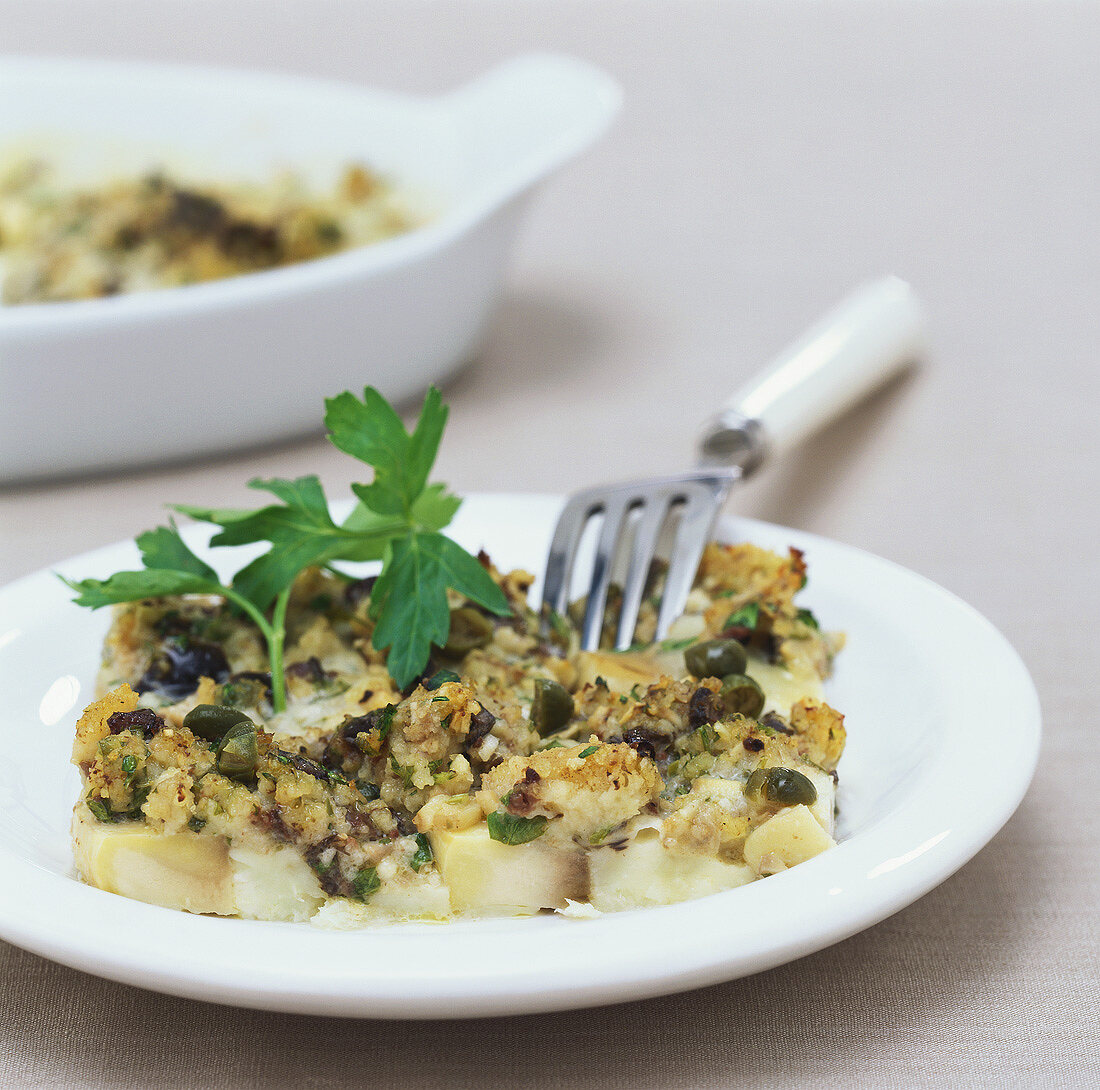 Mushroom gratin with capers, olives & anchovies