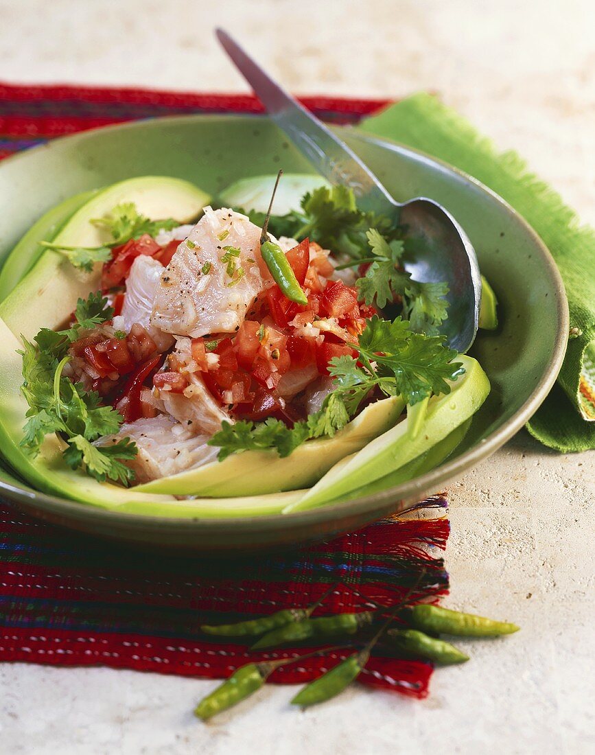Ceviche: fish fillet with coriander and tomatoes