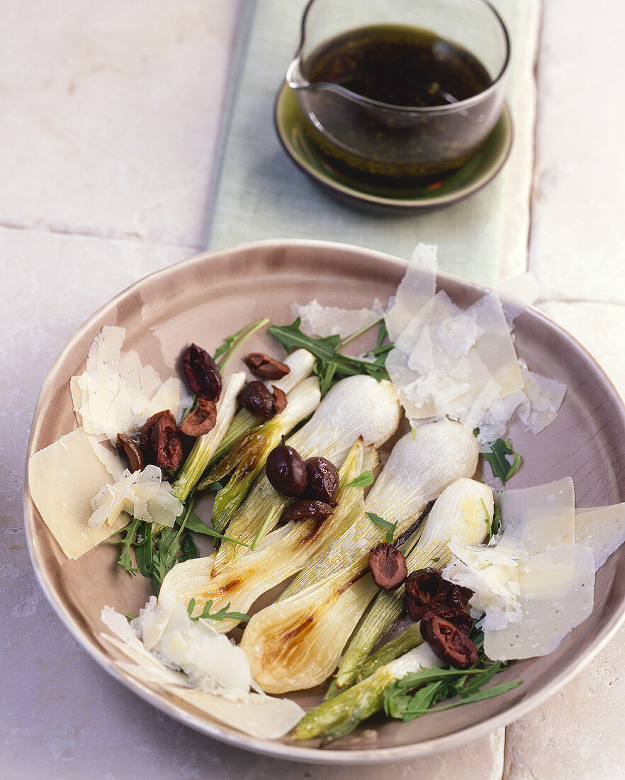 Spring onions with rocket, olives and Parmesan