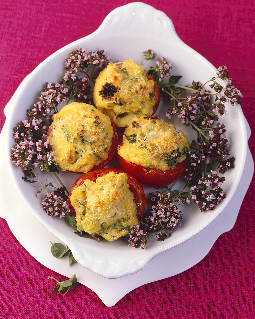 Polenta-stuffed tomatoes with oregano flowers