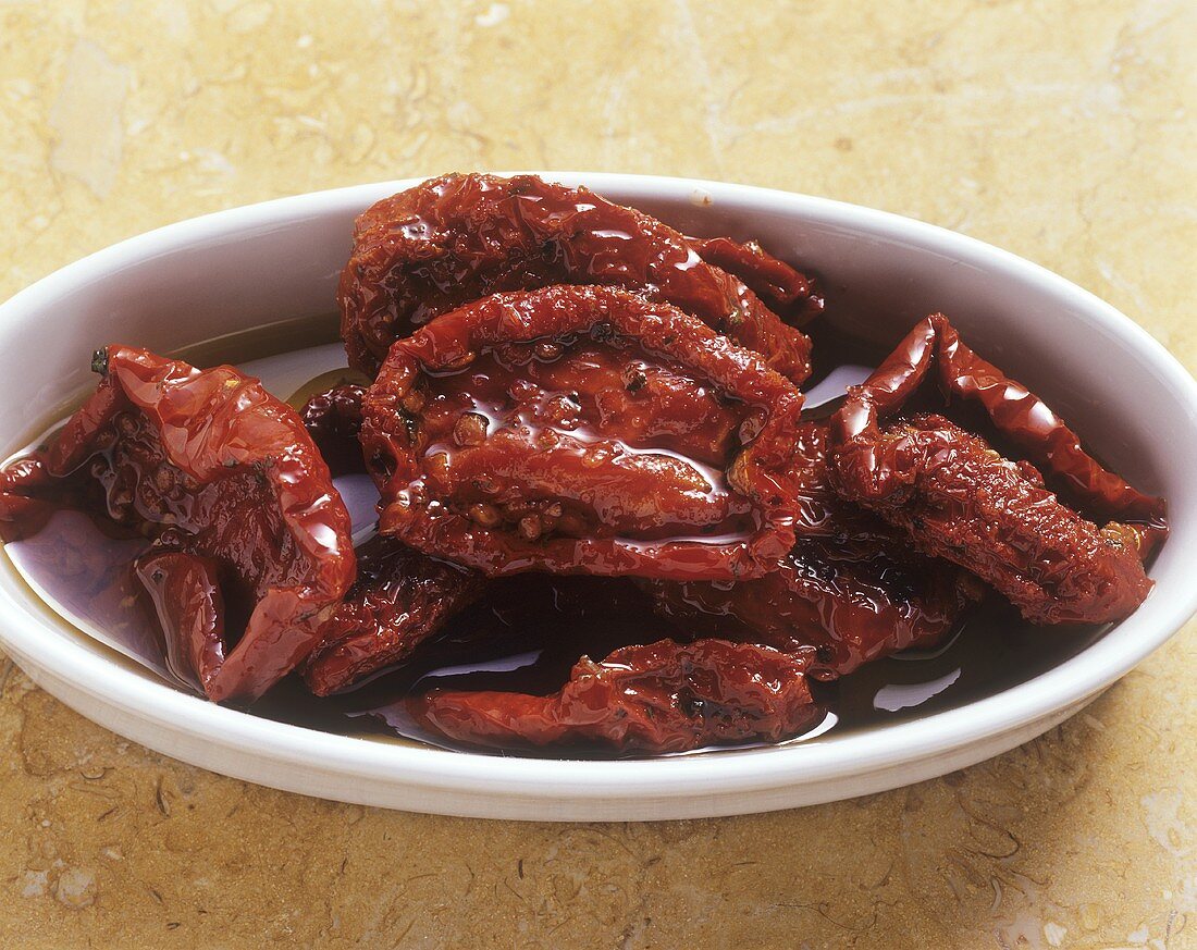 Small dish of dried tomatoes in oil