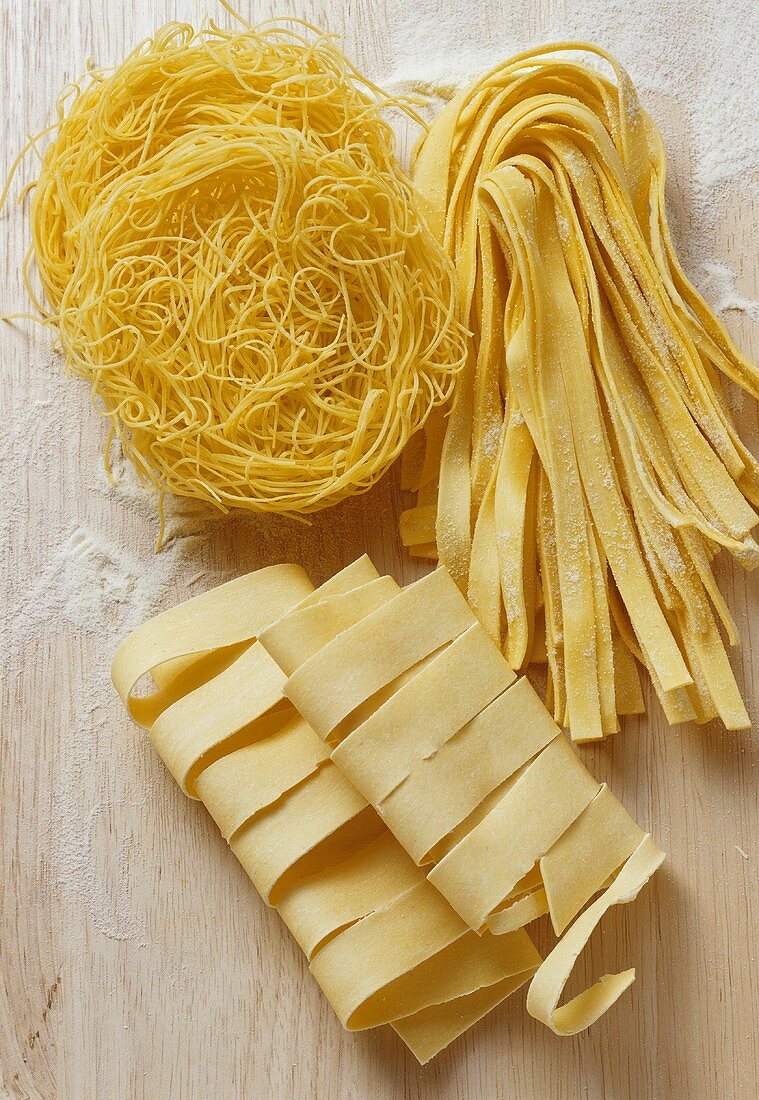 Various types of pasta: pappardelle, tagliatelle & vermicelli