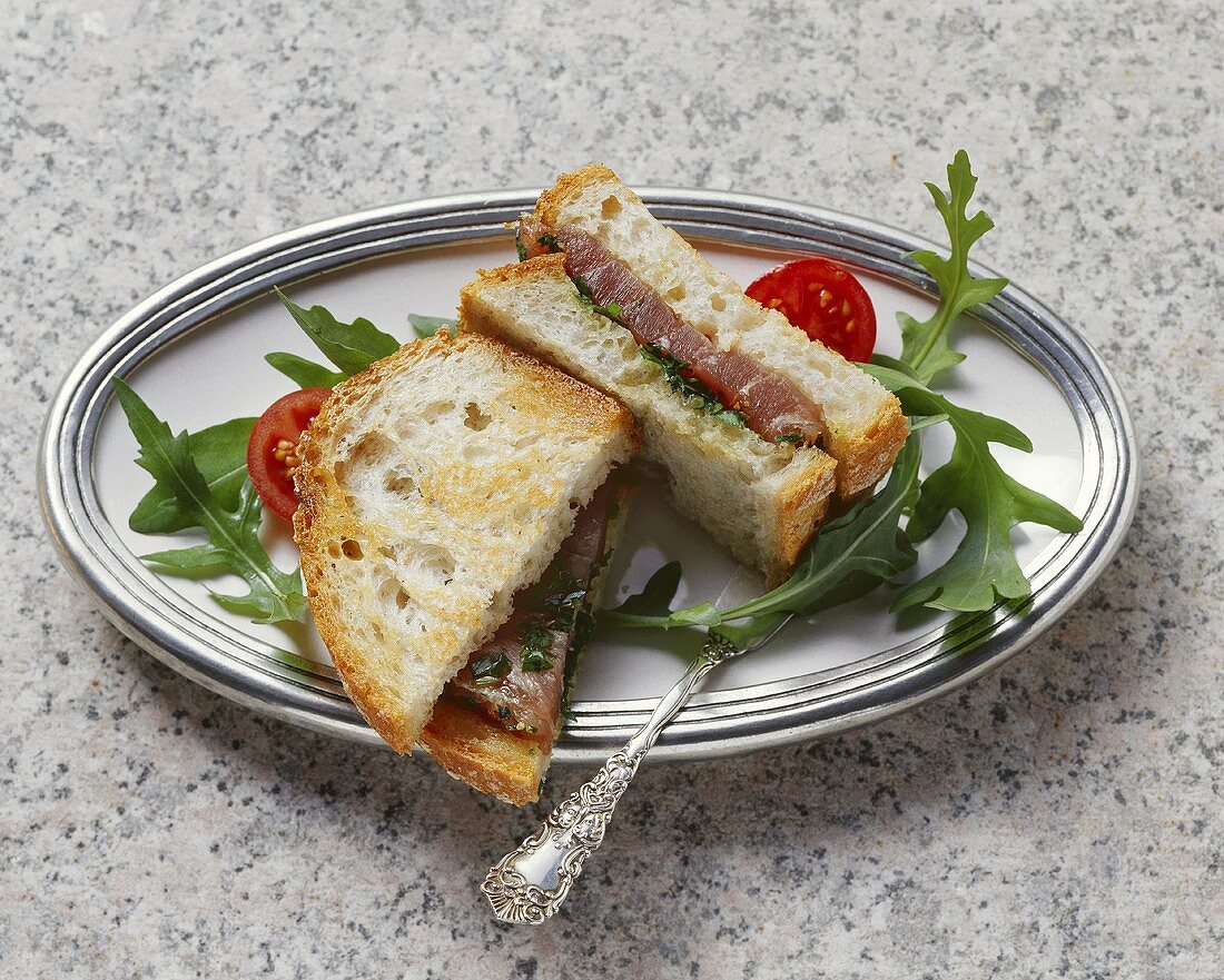 Tuna ciabatta on rocket salad