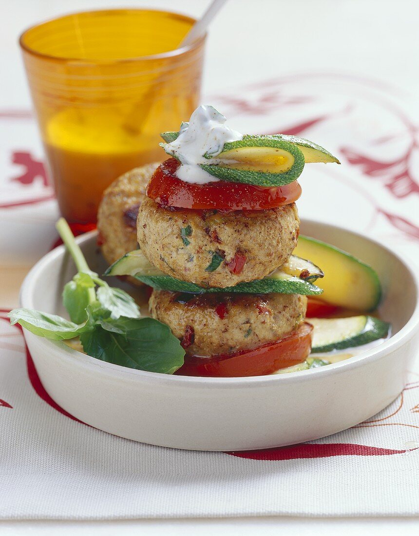 Veal and tofu burgers with tomatoes and courgettes