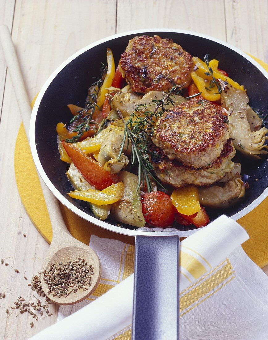 Mehrkornpflanzerl mit Artischocken und Paprika