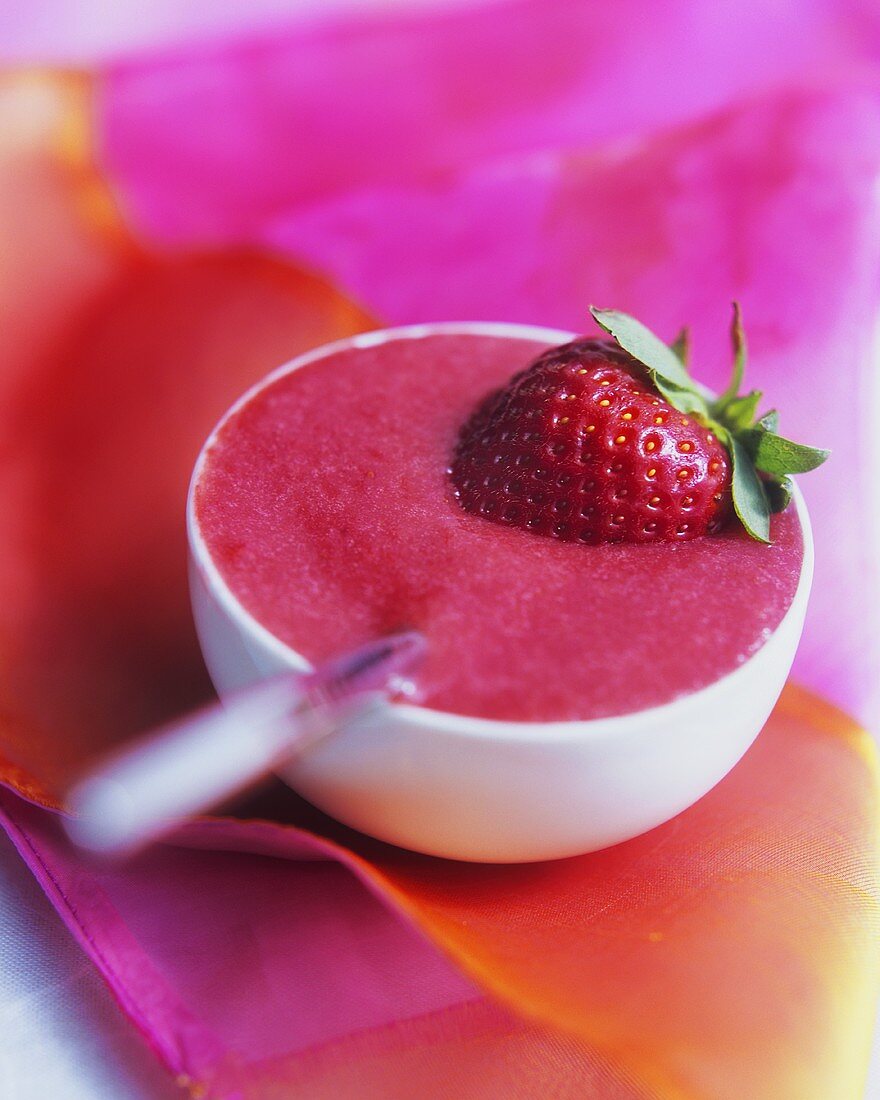 Strawberry puree or strawberry smoothie in a dish