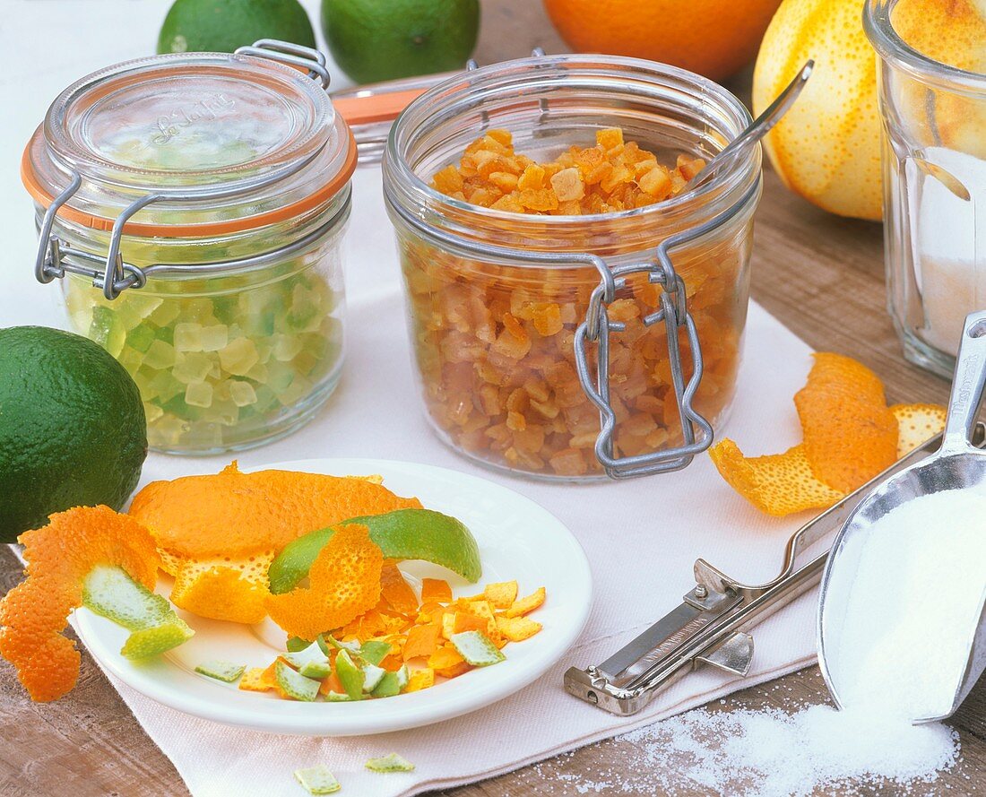 Candied orange and lime peel in preserving jars