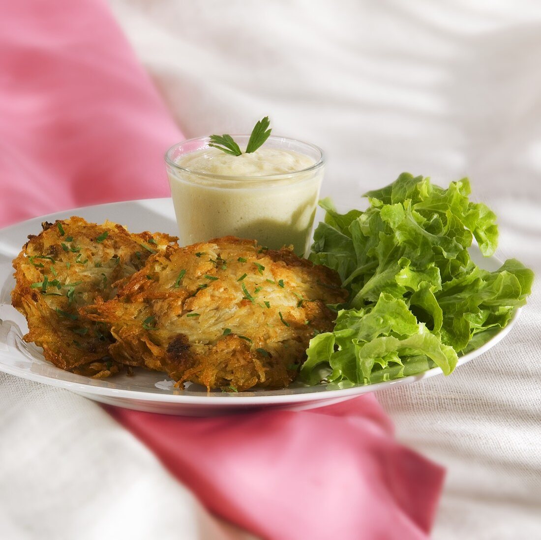 Fish and potato cakes with lollo bianco and yoghurt dip