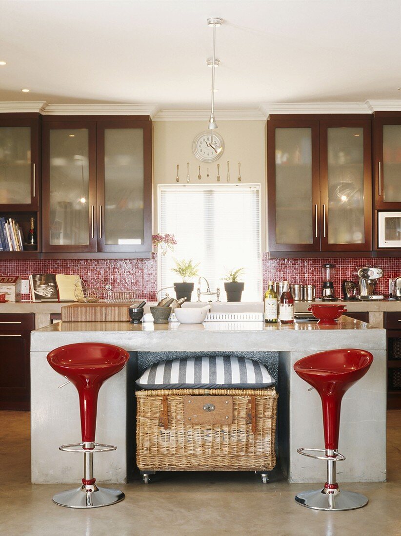 View into a kitchen with bar stools