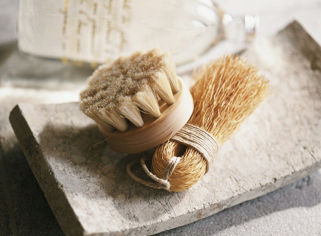 Two brushes in a dish