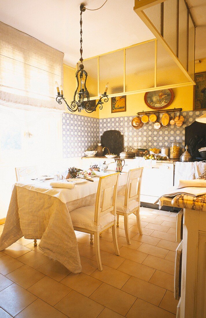 A kitchen with a dining table