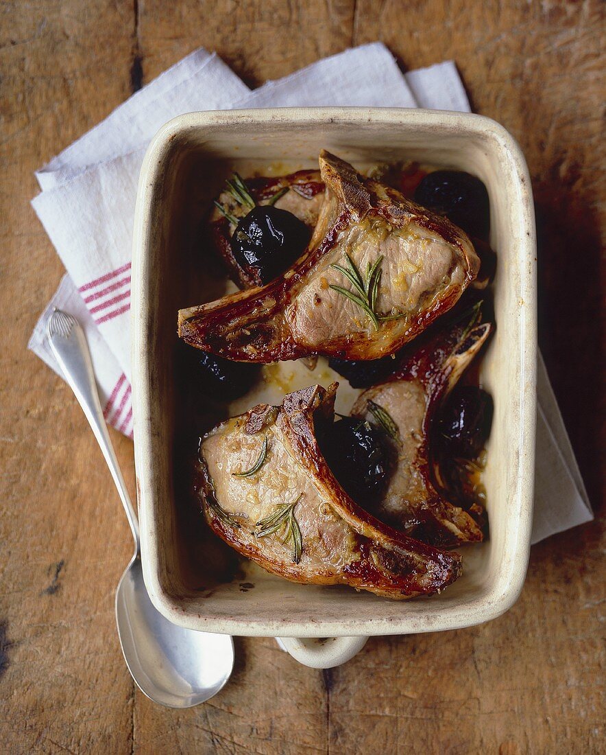Marinated wild boar chops with prunes in Armagnac