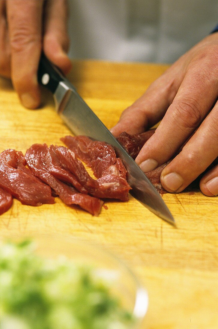 Beef fillet being sliced