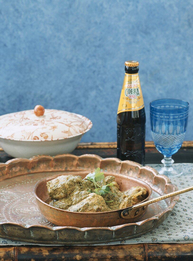 Braised chicken with beer, India