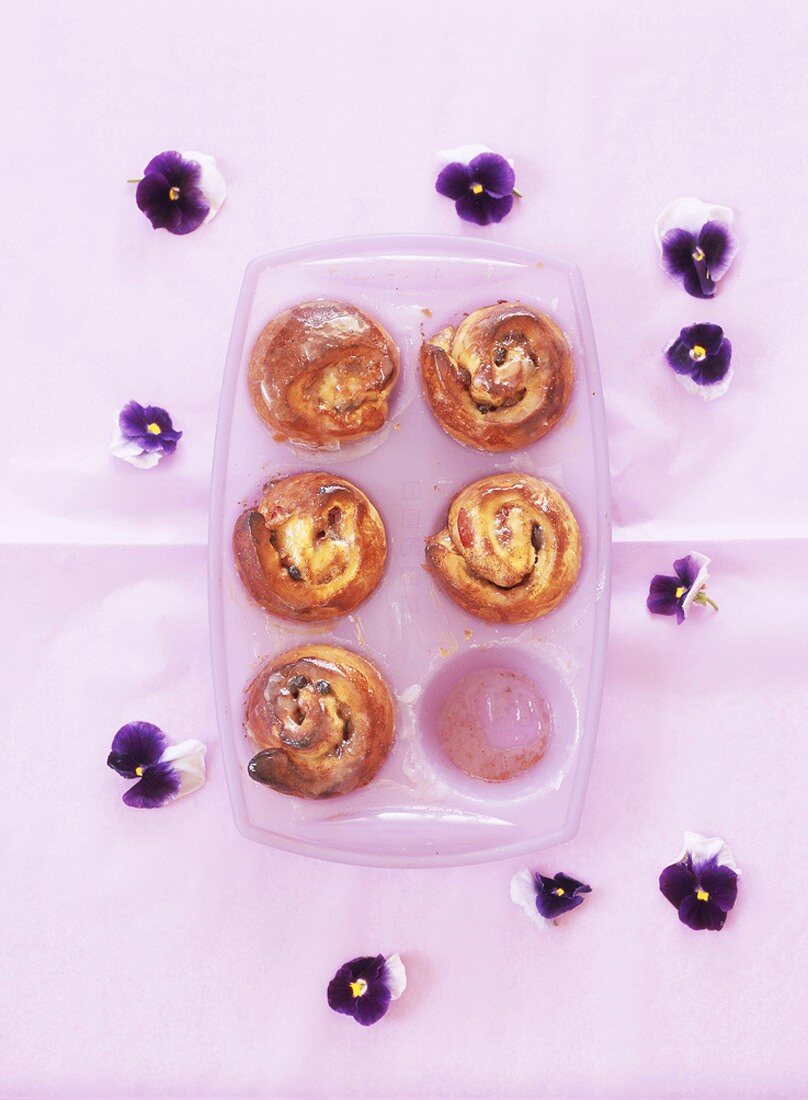 Plum muffins with pansies