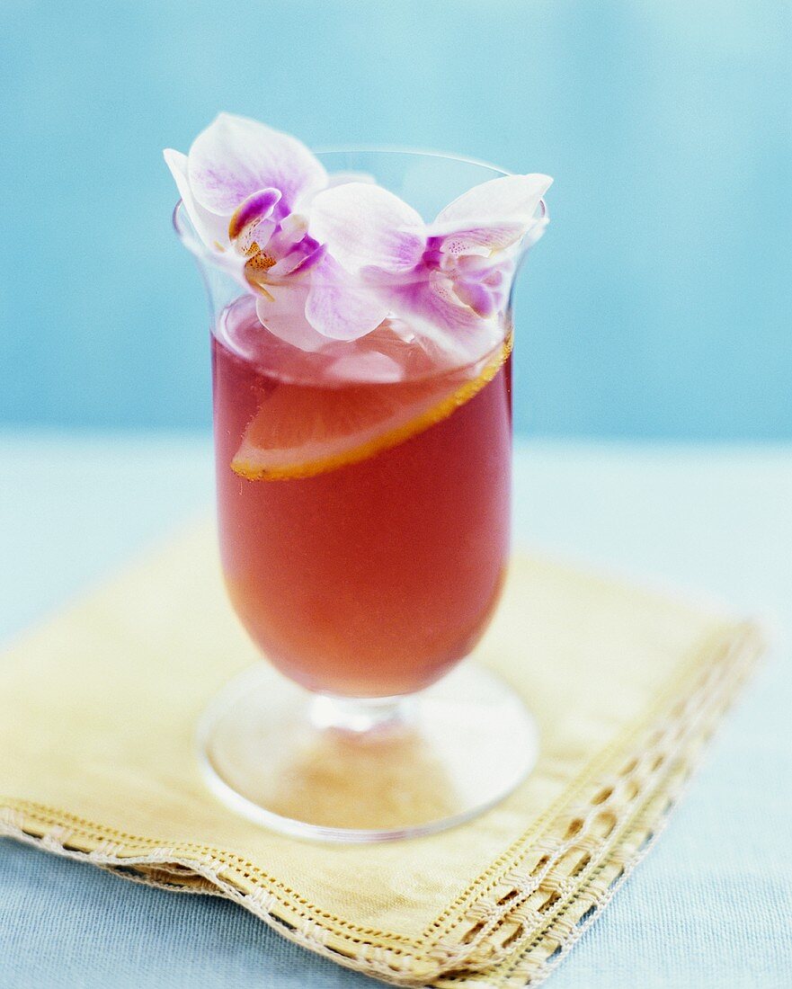 Hibiscus sangria with orchid decoration