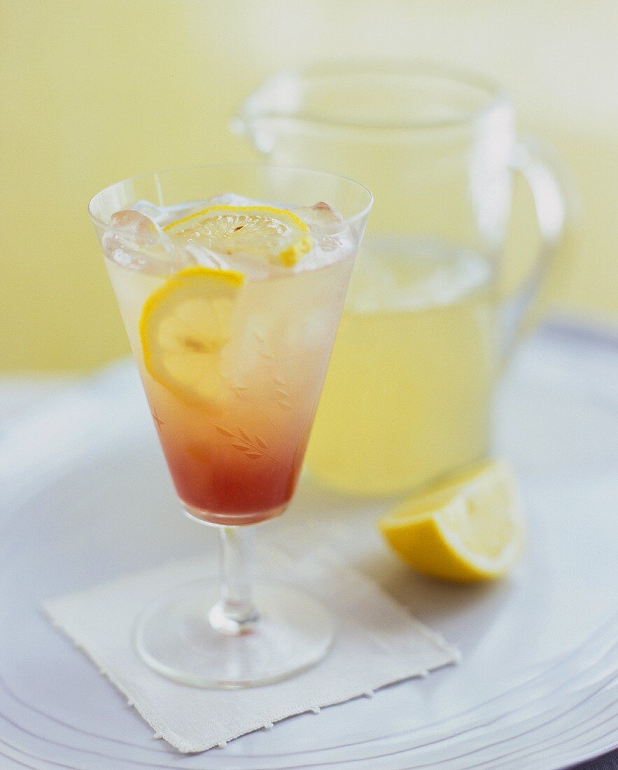 Lemonade punch with ice cubes