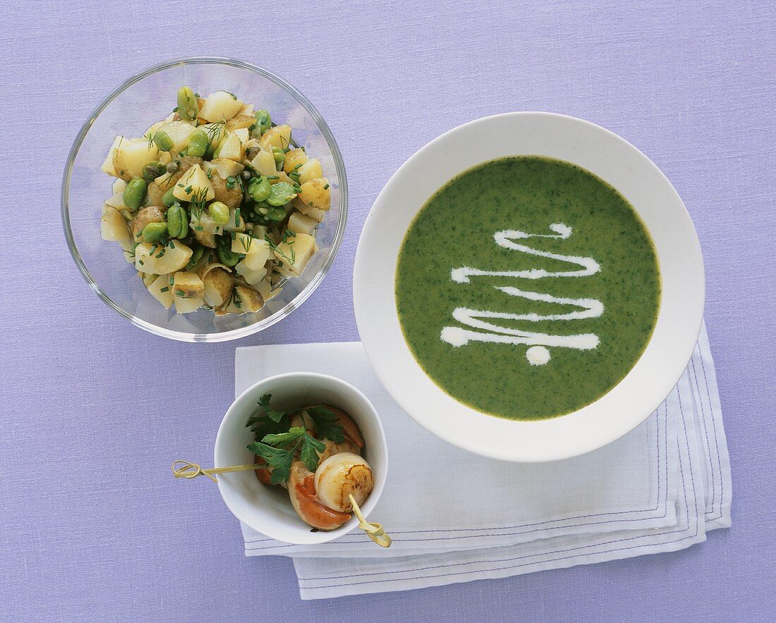 Parsley soup, scallop skewers and potato salad
