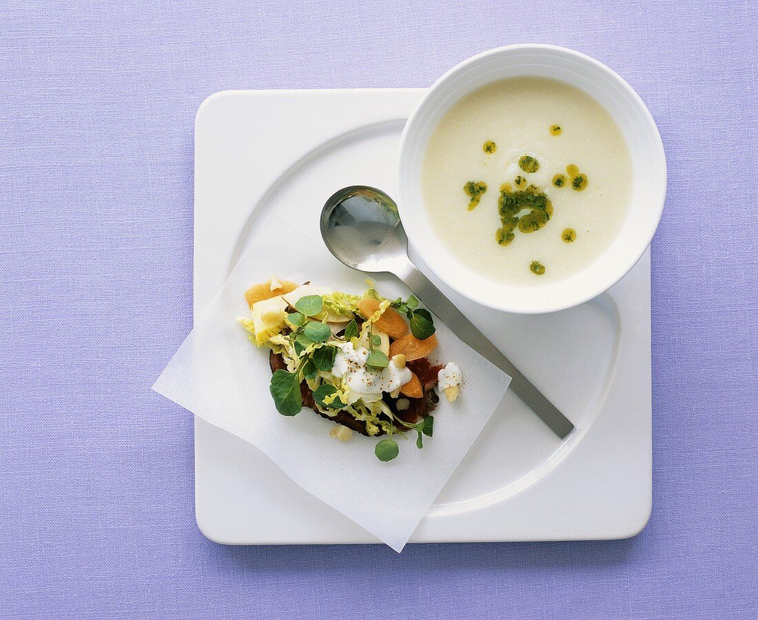 Cream of cauliflower soup with coriander and side salad