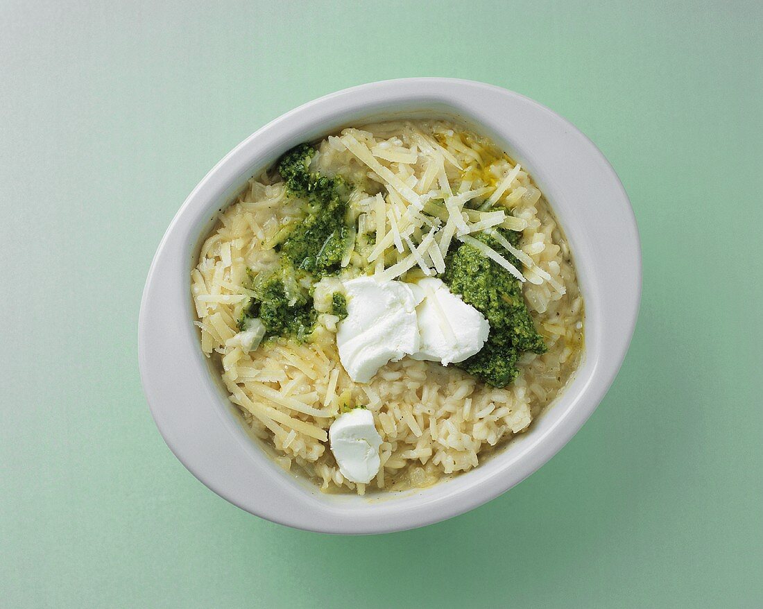 Baked risotto with pesto, goat's cheese and Parmesan