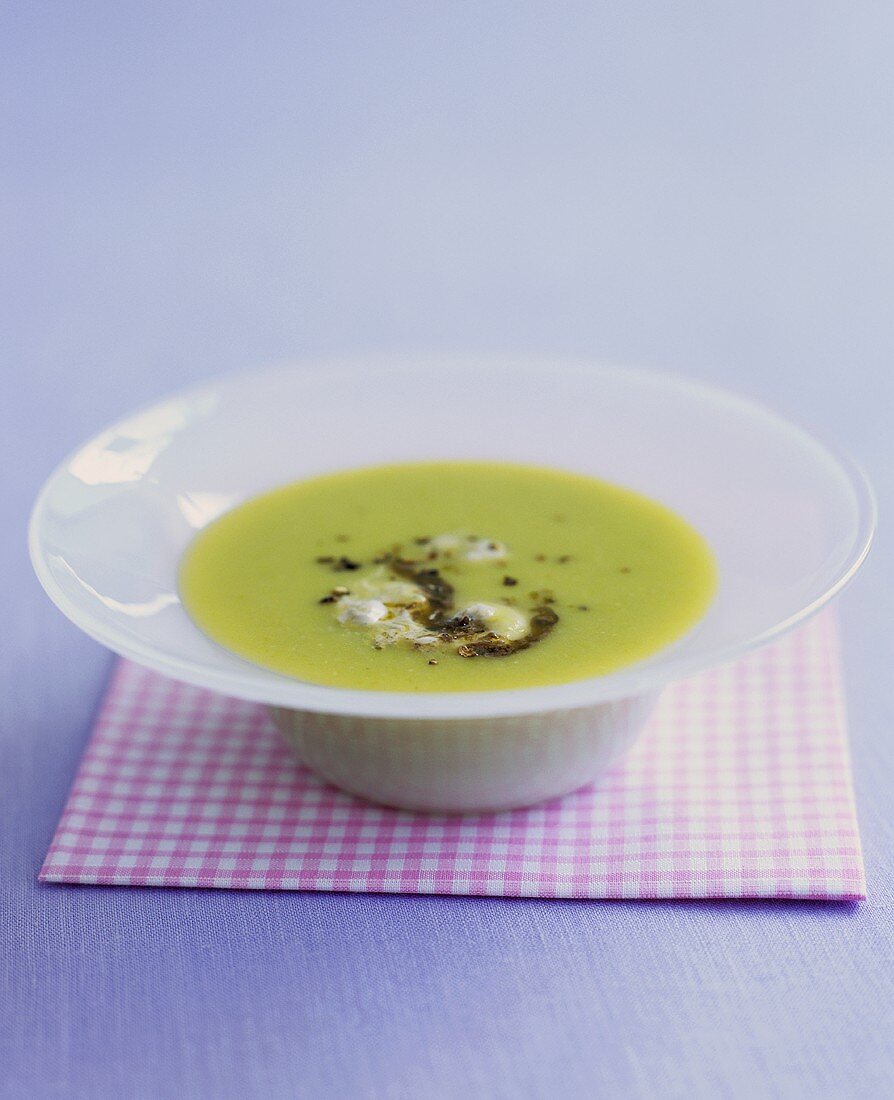 A dish of broad bean soup with tapenade