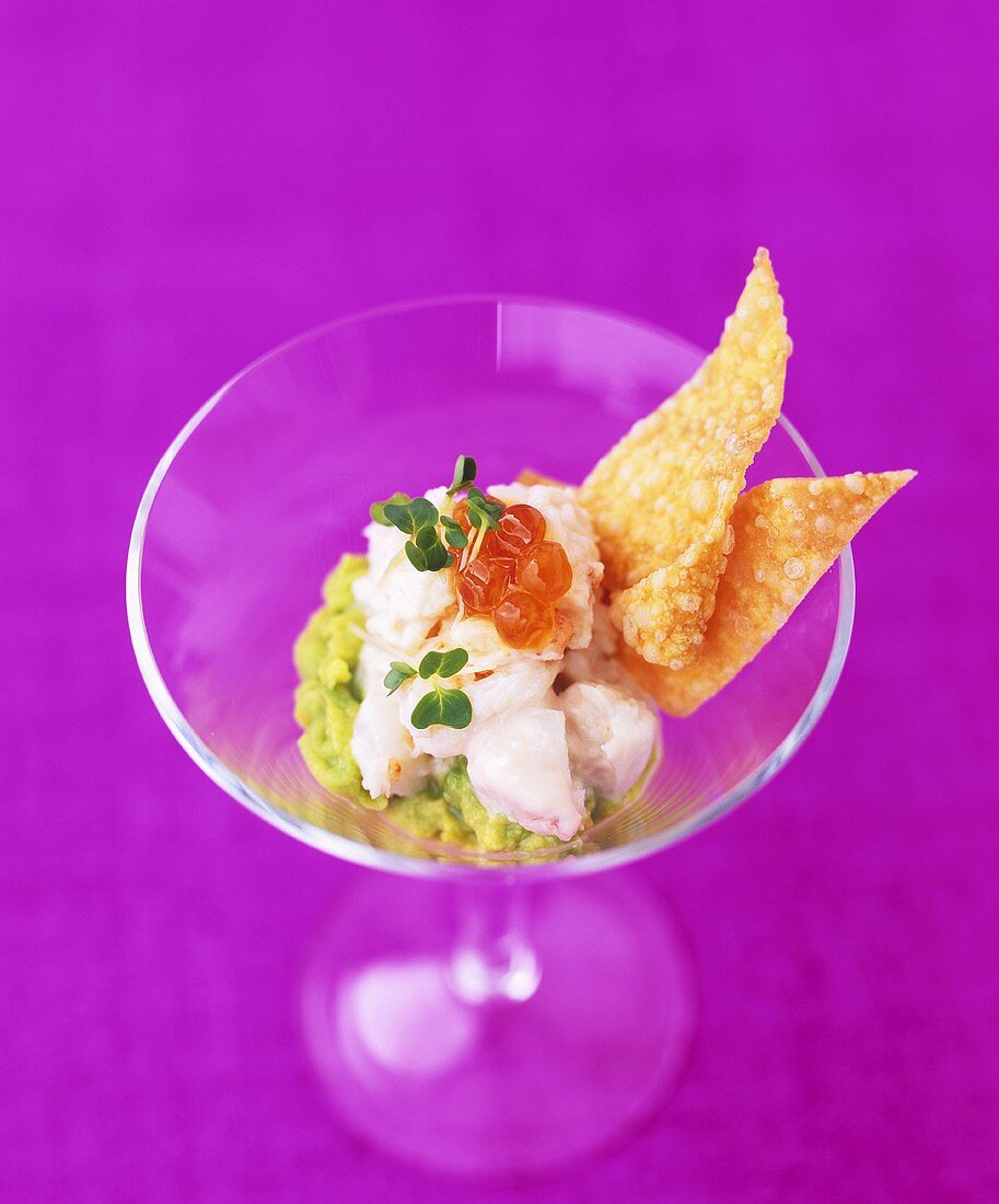 Crab cocktail in a glass with crispy wonton pastry