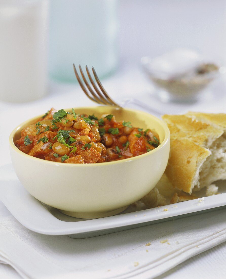 Bean and bacon stew, with baguette