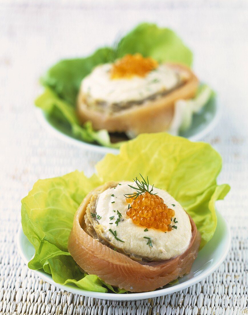 Stuffed artichoke hearts with smoked trout and caviar
