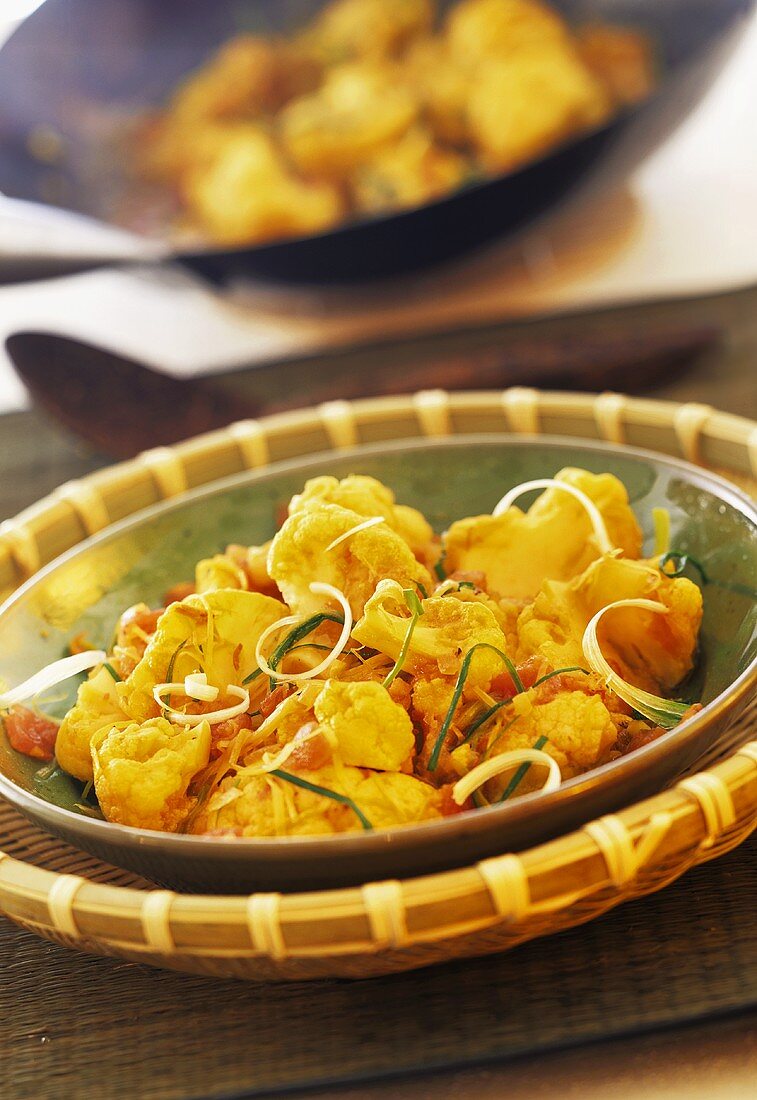 Stir-fried cauliflower, leeks and tomatoes with chilli (Indonesia)