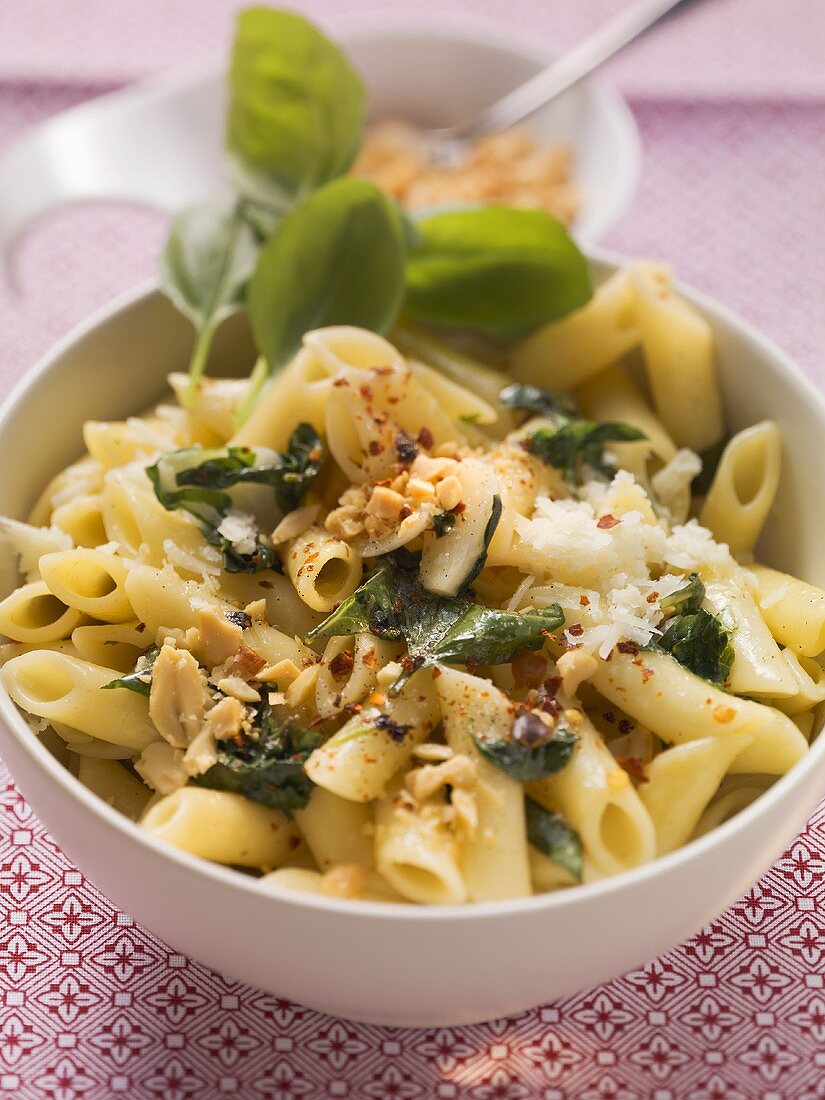 Penne with chilli & vanilla scattered with peanuts & basil
