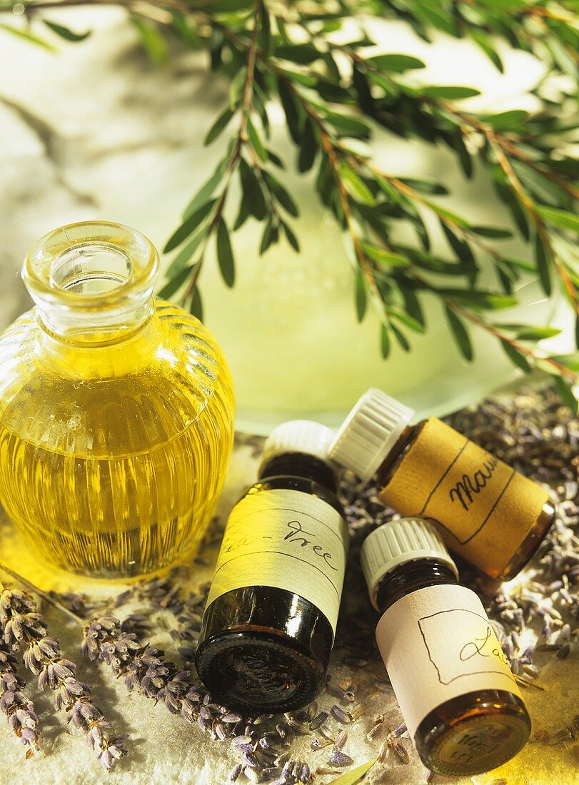 Tea tree, lavender and manuka oils in small bottles