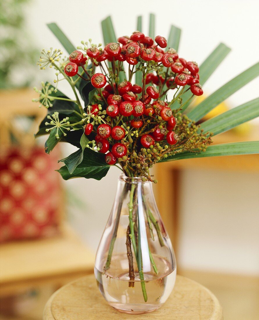 Rose hips 'Giant Fantasy' in a vase