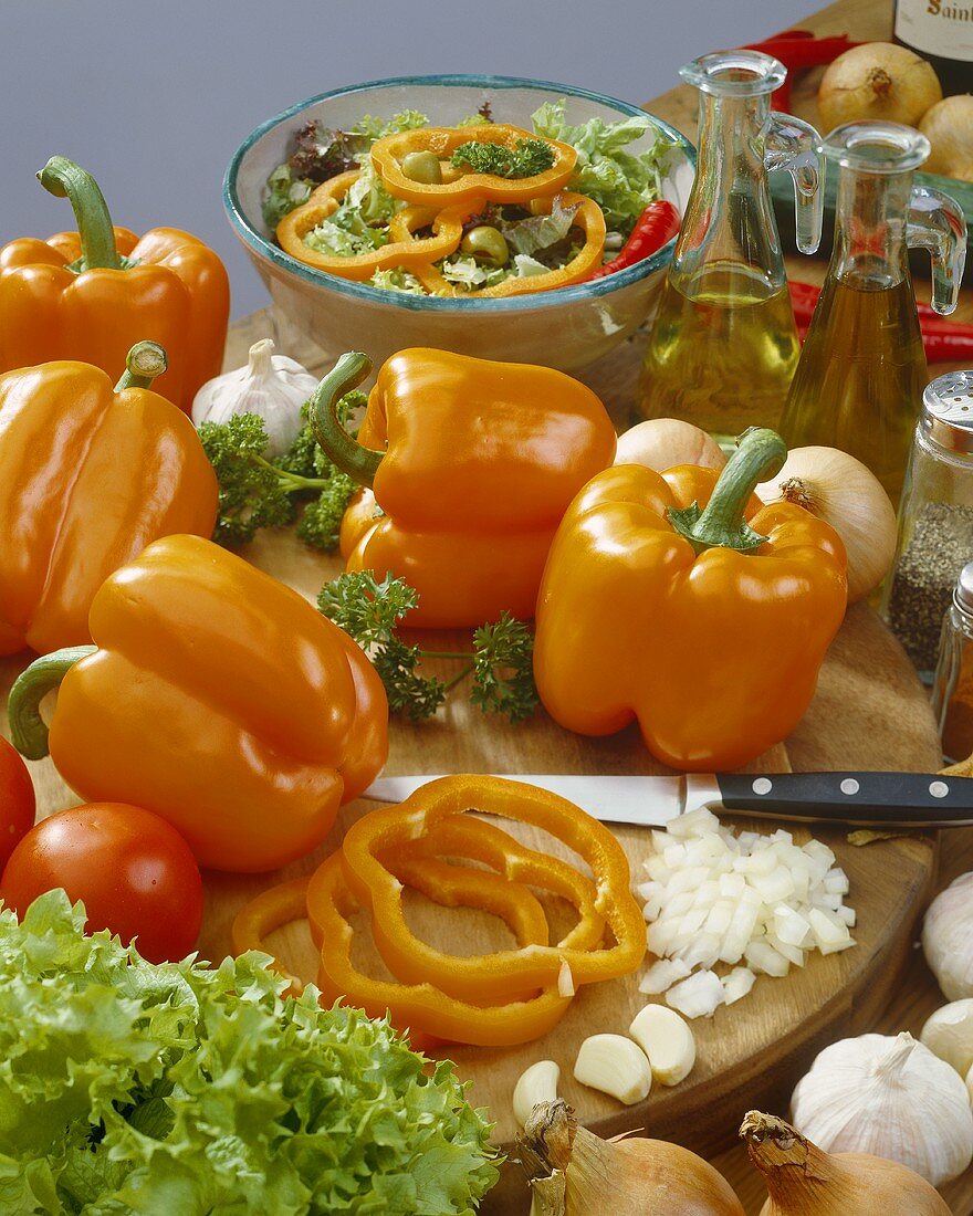 Still life with orange peppers