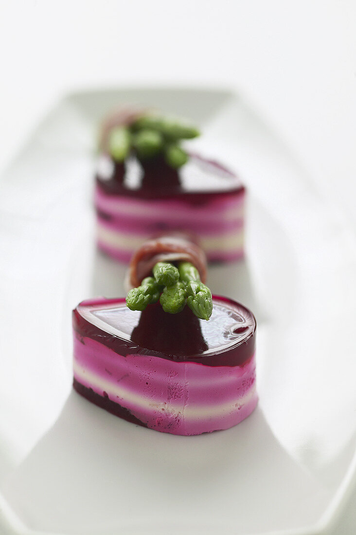 Beetroot and soft cheese 'chocolates' with Thai asparagus