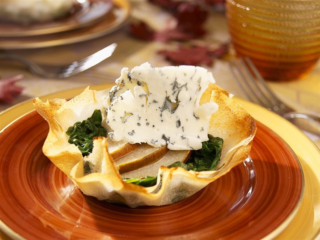 Spinach, pear and blue cheese in filo pastry basket
